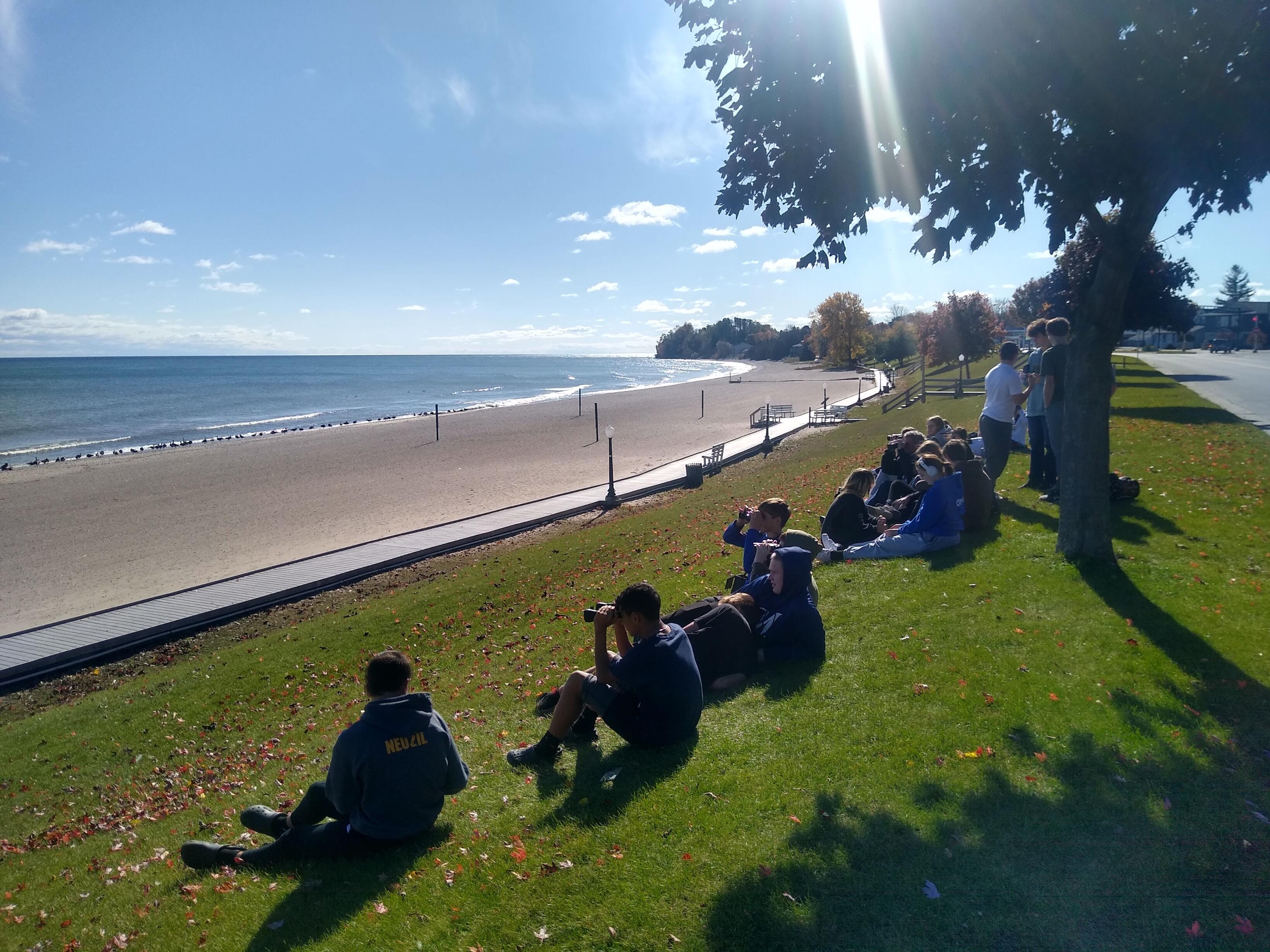 Students observing migrating water fowl