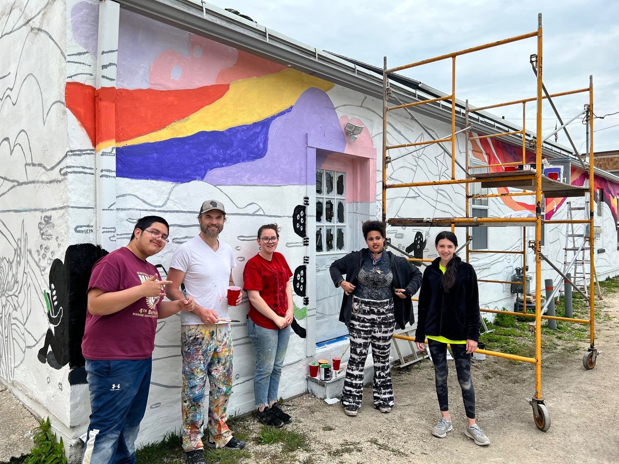 Students painting outside