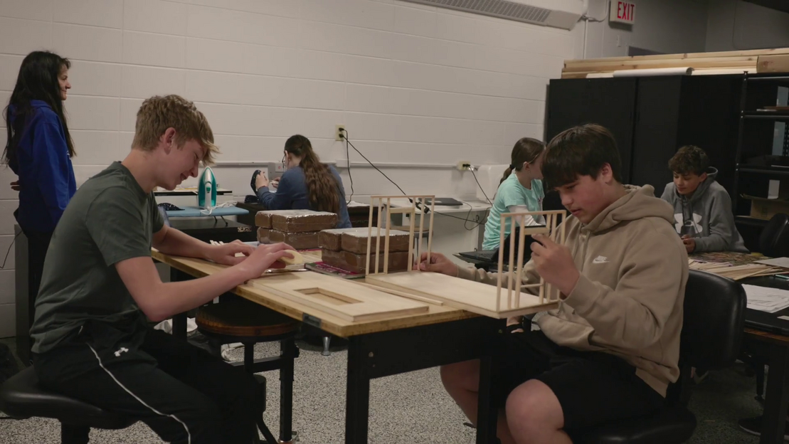students building model