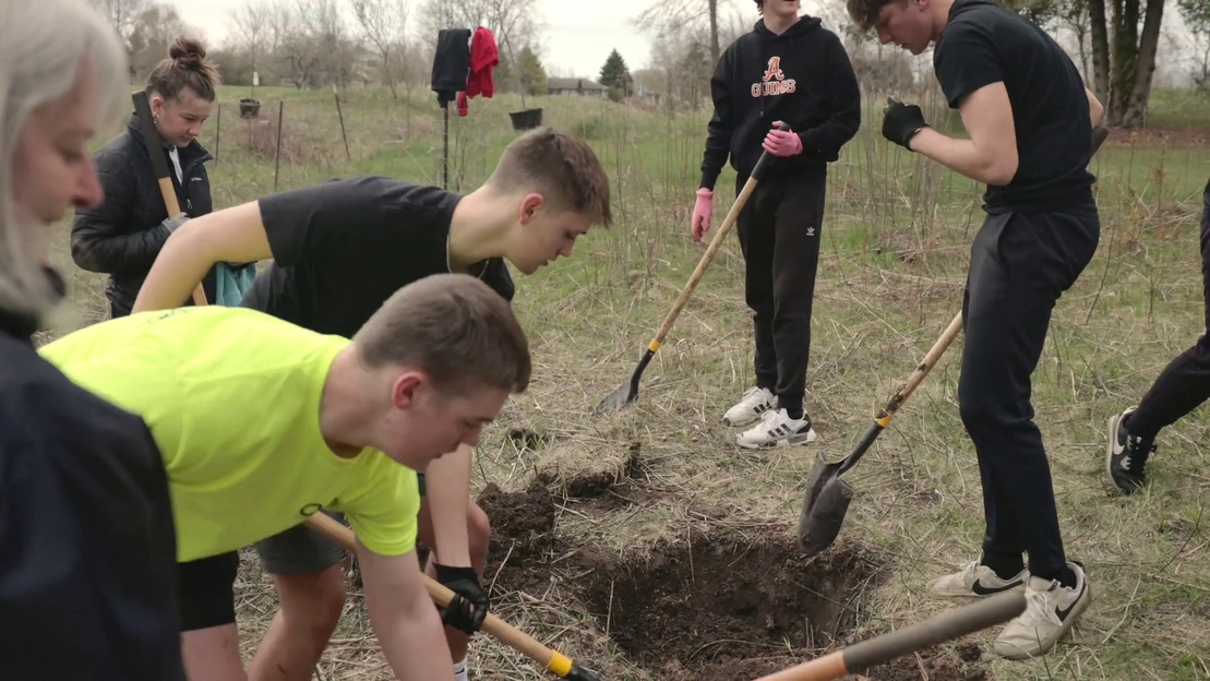 students digging